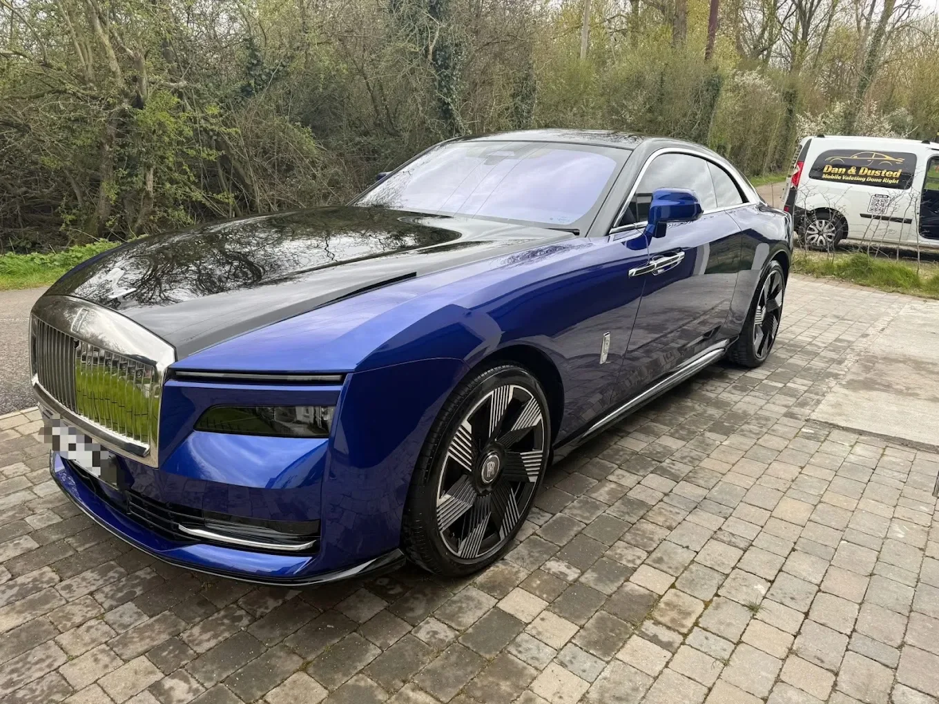 Rolls Royce Spectre luxury car after a valet done by mobile car wash in Chelmsford called Dan & Dusted. Interior deep clean including seats shampooing and extraction done at the customer's workplace.