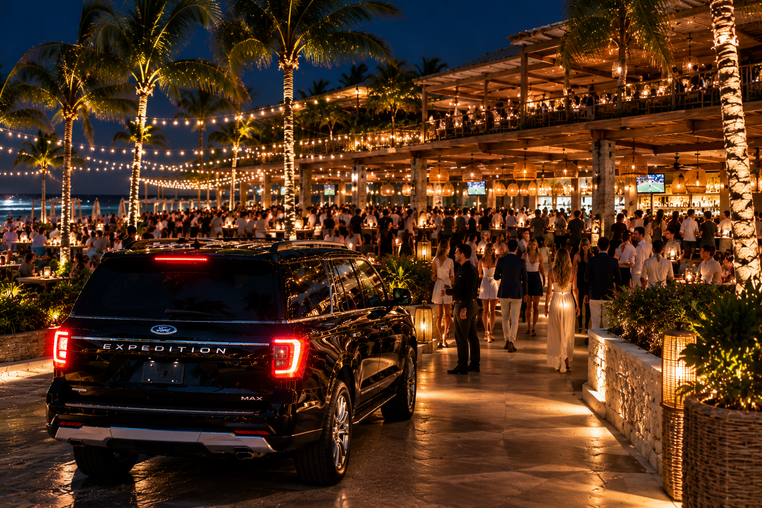 Black Ford Expedition SUV outside a lively beachfront restaurant illuminated by string lights and palm trees at night