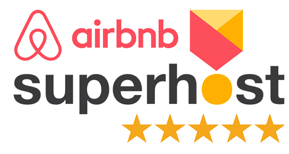 Airbnb Superhost badge with five gold stars beneath the text.