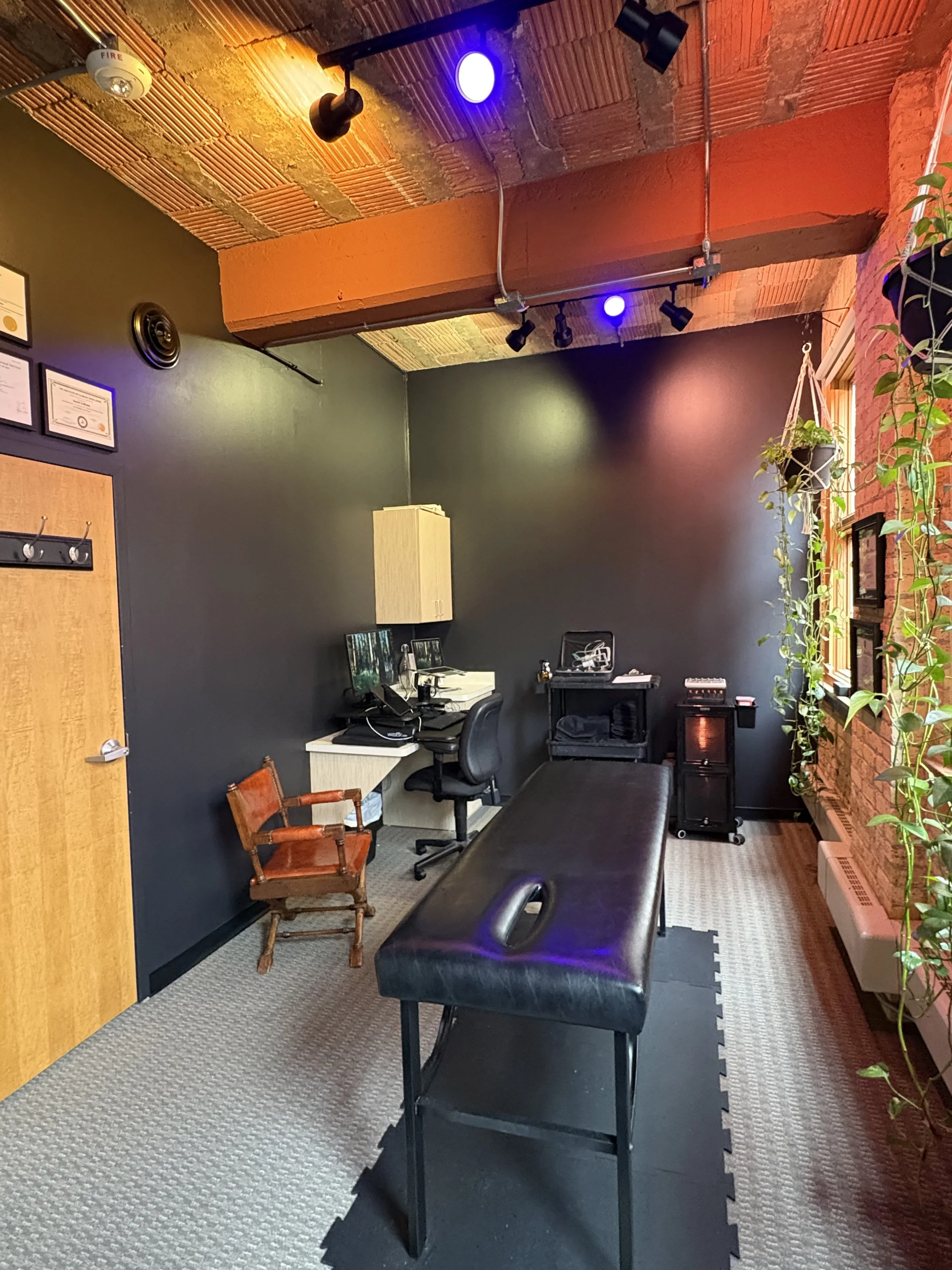 Physical therapy office with dry needling and cupping equipment in background in downtown milwaukee