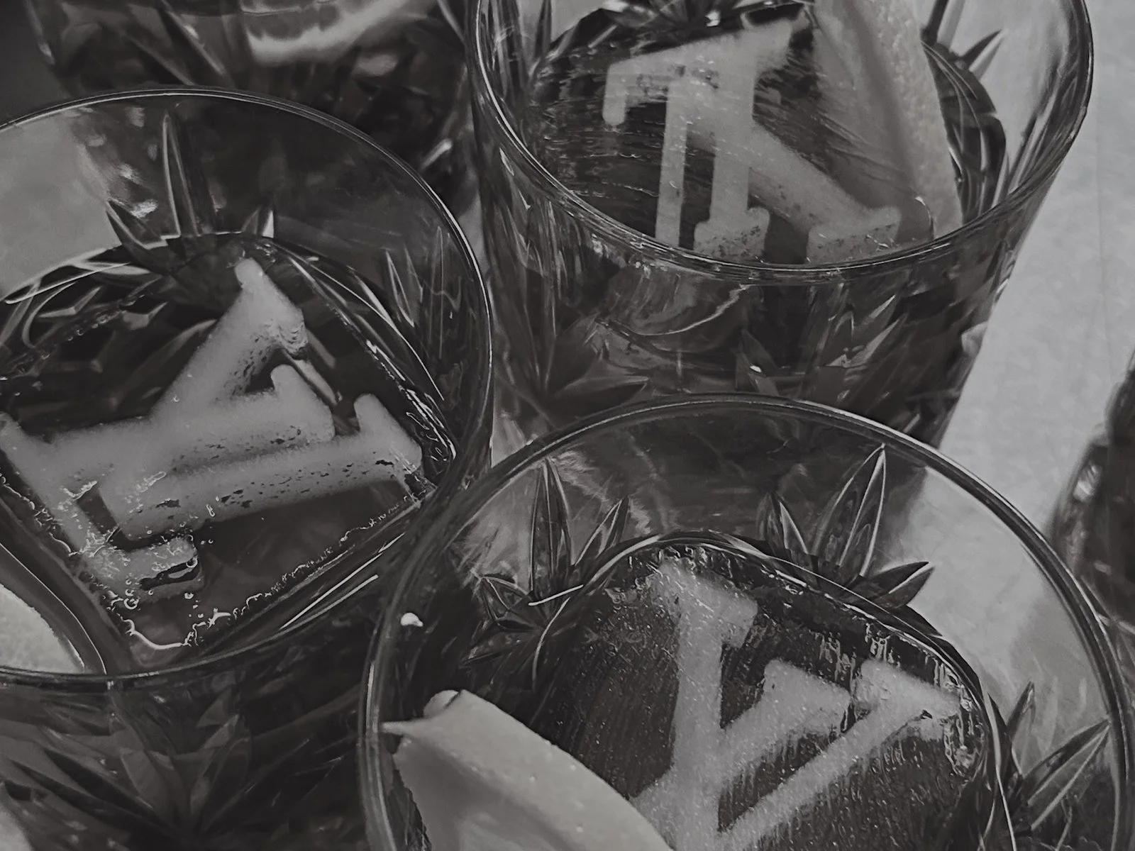 Cocktails with Louis Vuitton monogram ice cubes at a Louis Vuitton client event
