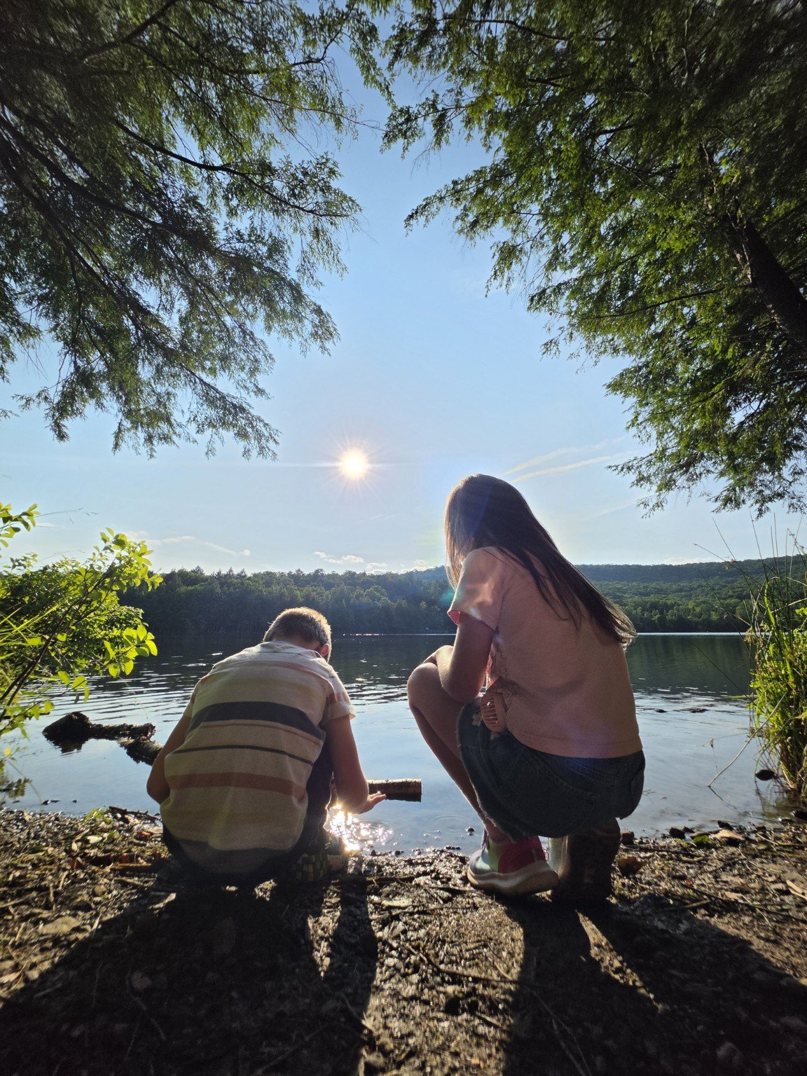 Kids by the lake