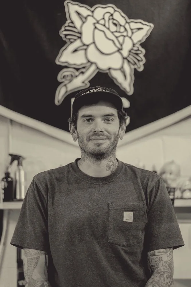 Drew Morgan, tattoo artist at District Tattoo Co., in the shop