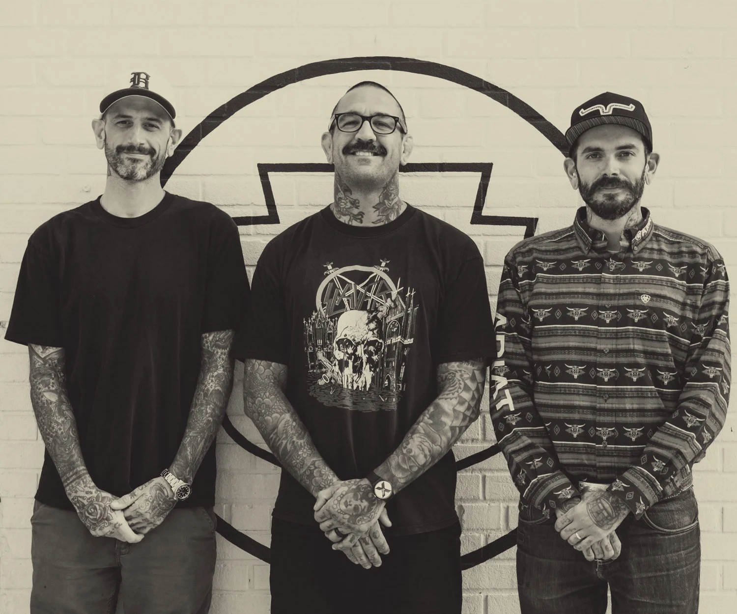 Founders Ryan Clarke, Drew Morgan and Billy Bennett at District Tattoo Co.