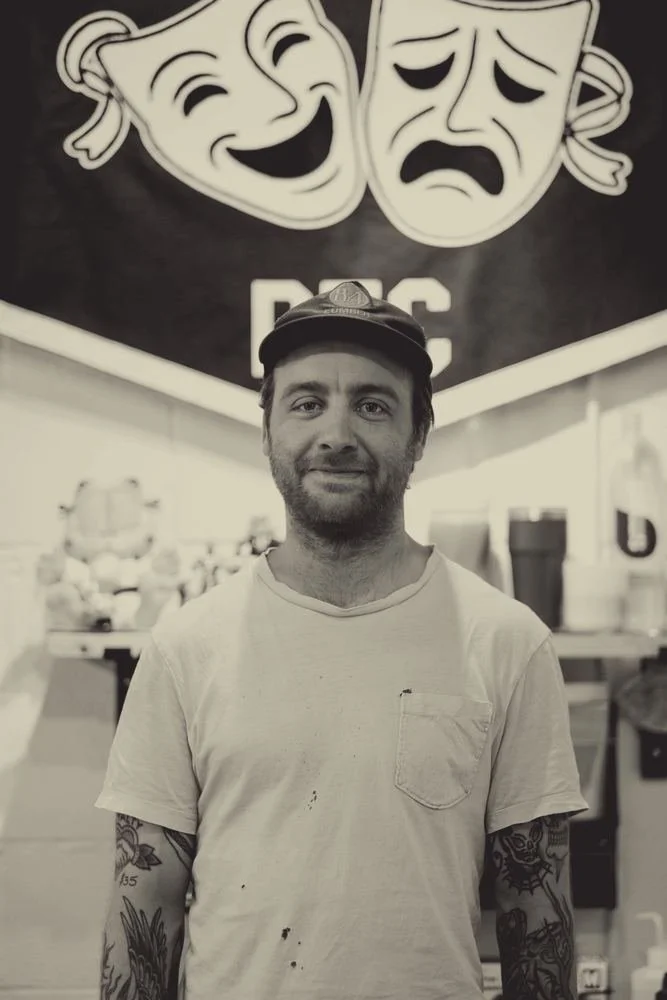 Tim Huck, tattoo artist at District Tattoo Co., in the shop