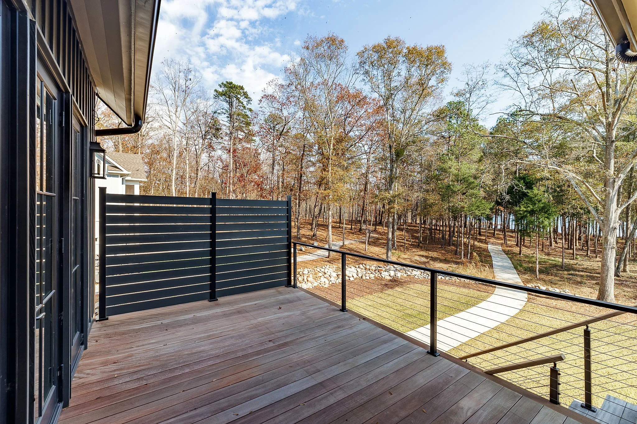 Deck with cable railing overlooking a wooded North Georgia lot