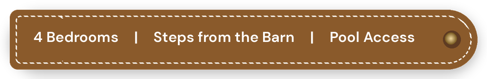 Brown leather sign with white text reading "4 Bedrooms | Steps from the Barn | Pool Access" and a decorative gold nail at the top right corner.