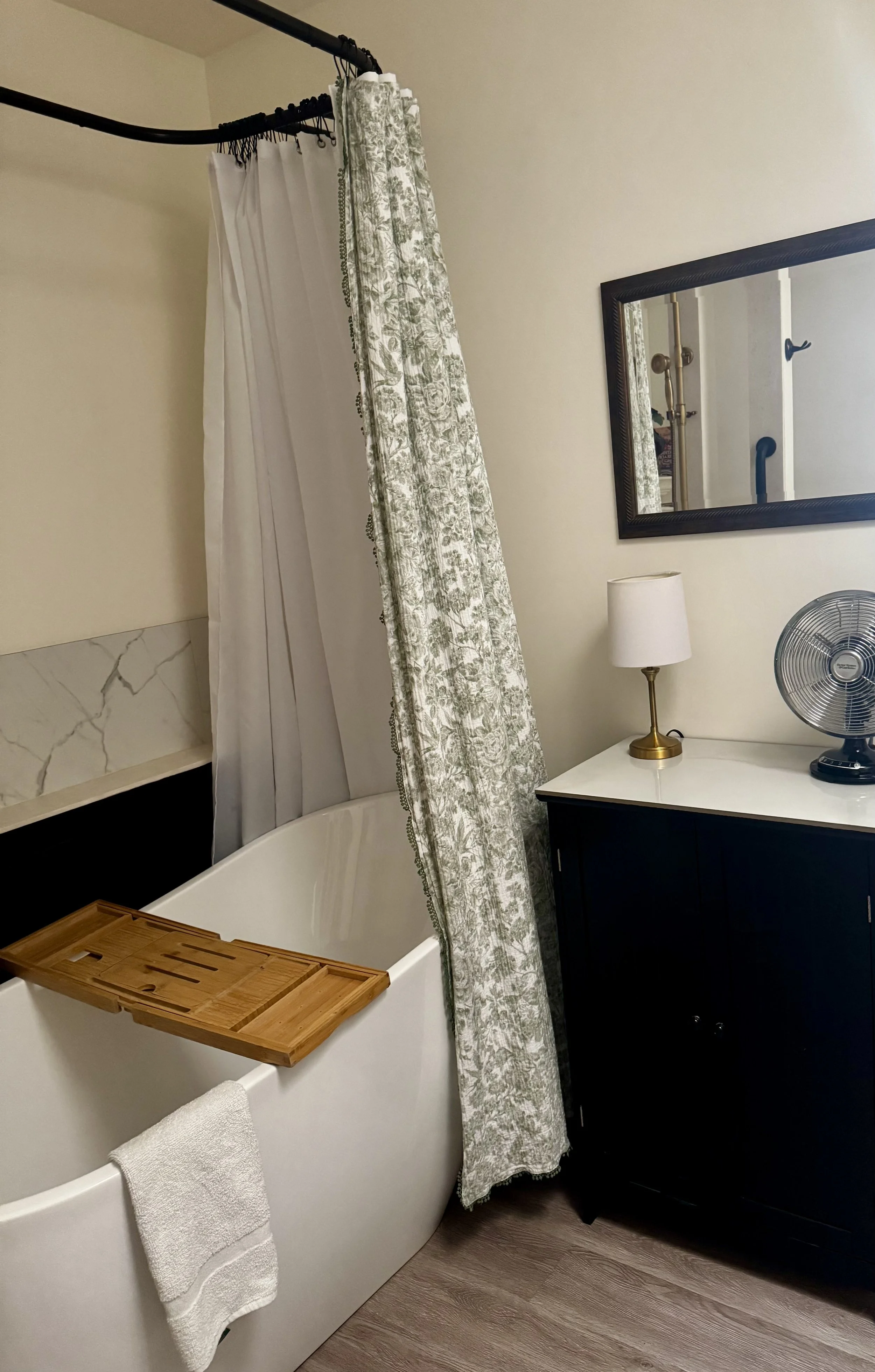 Spa-Inspired Bath: Unwind in a modern vintage spa bath, fully stocked with fresh towels, premium amenities, and extra storage.