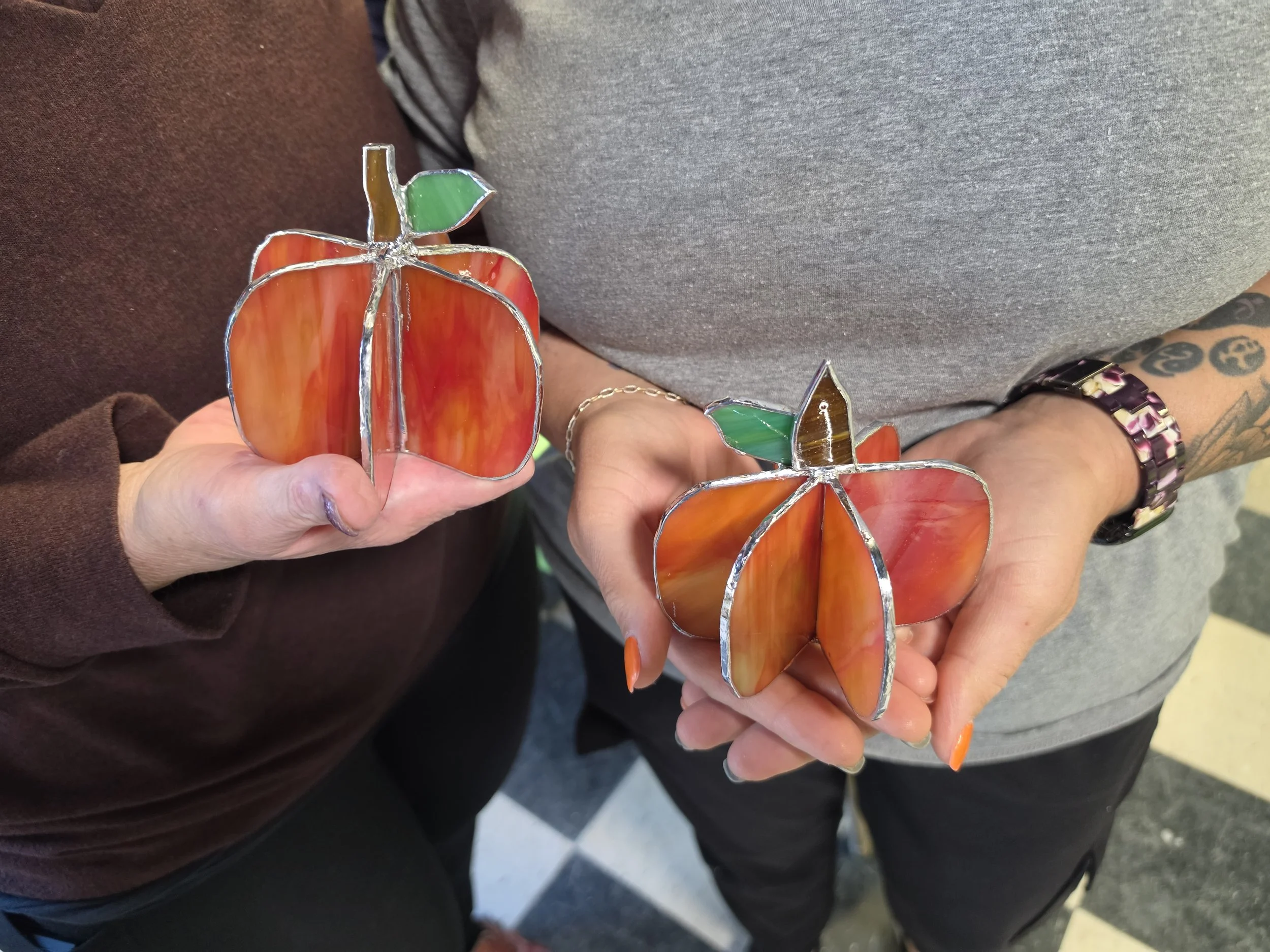beautiful stained glass pumpkins done in a class