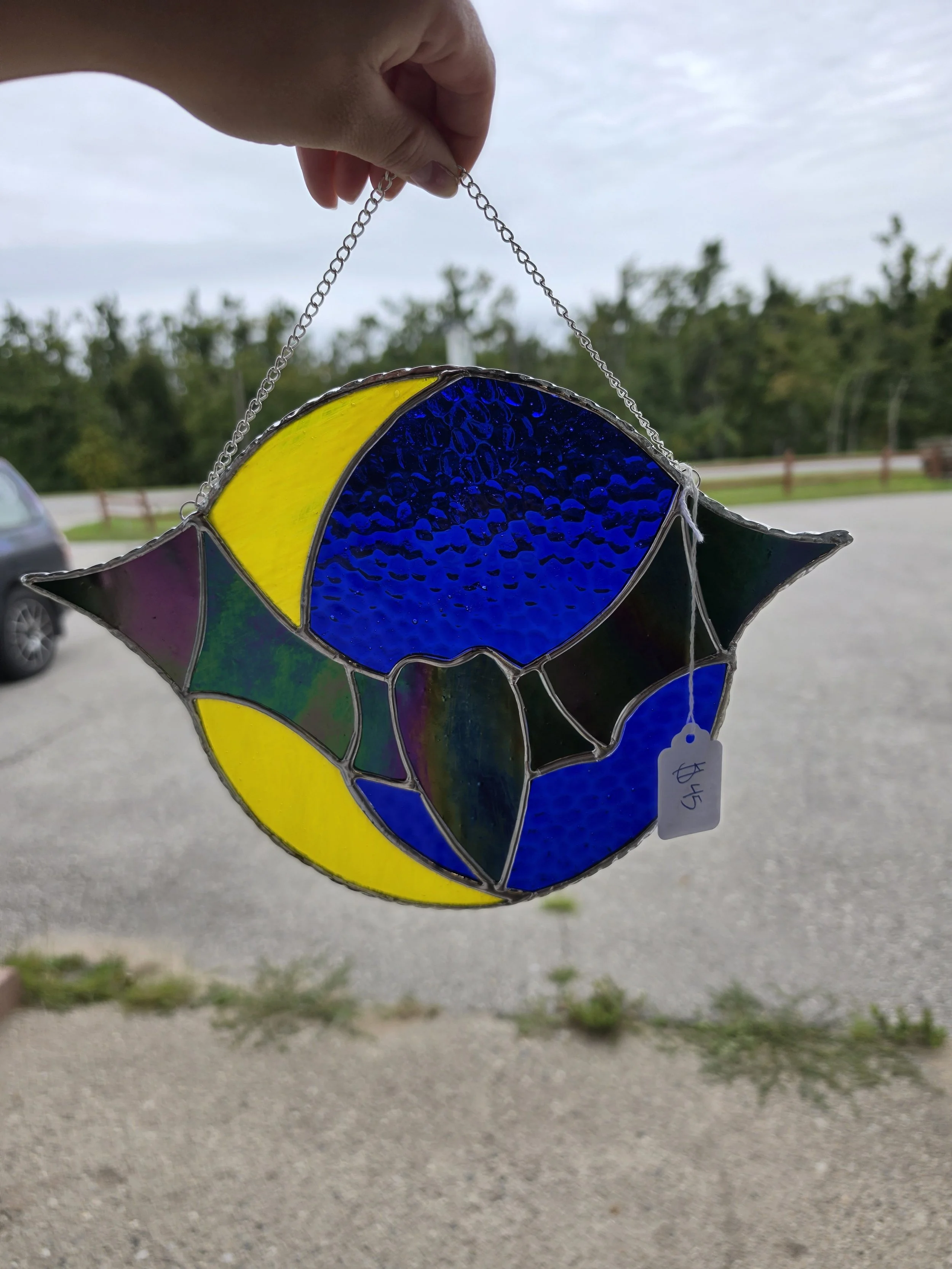 stained glass bat and moon