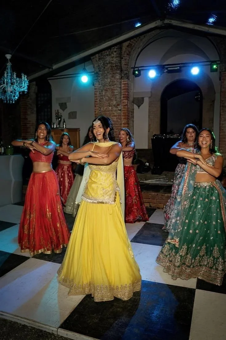 Capture behind-the-scenes chaos of dance practice for the Sangeet.