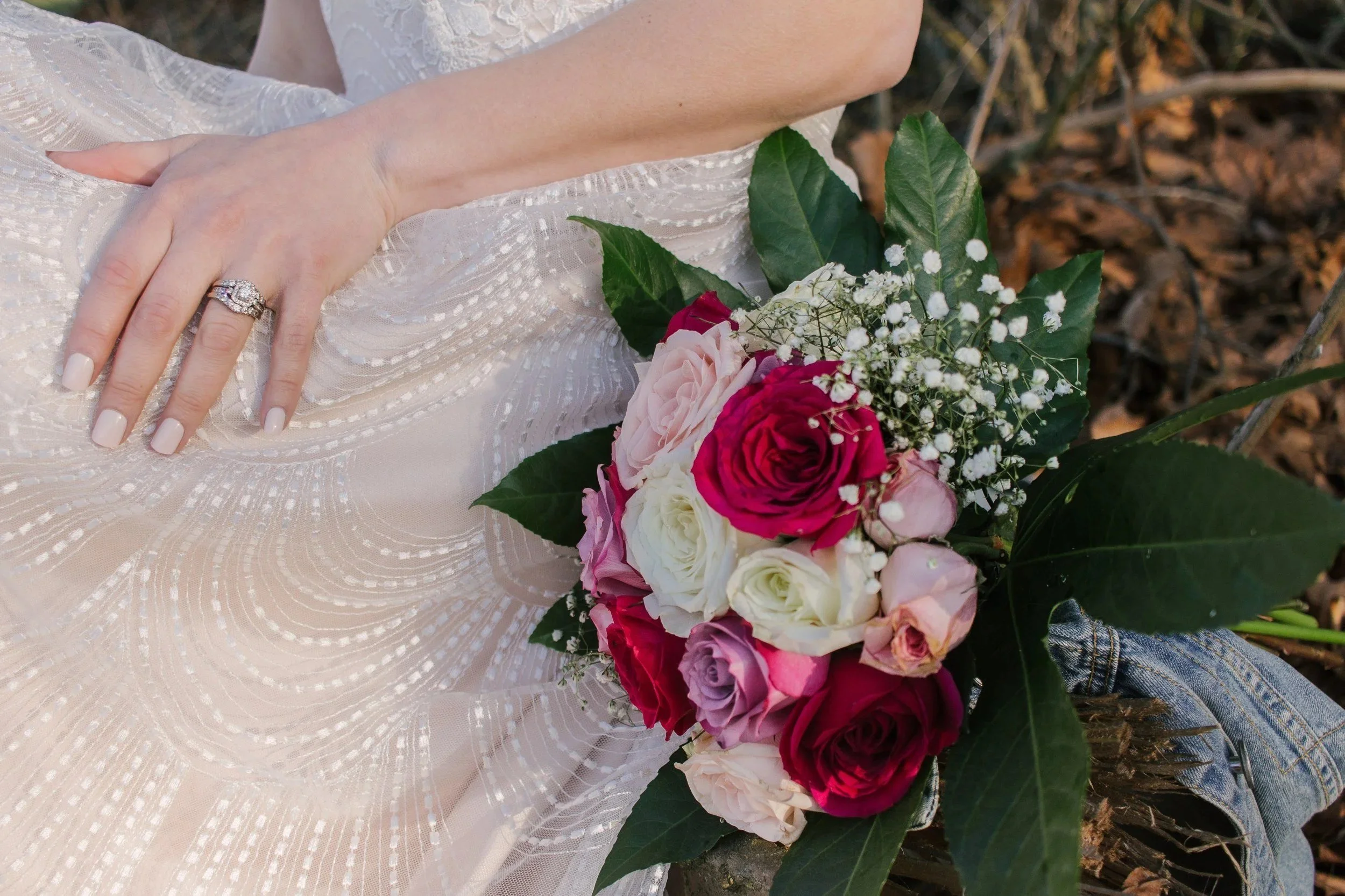 Close-up of a pink and red rose bridal bouquet