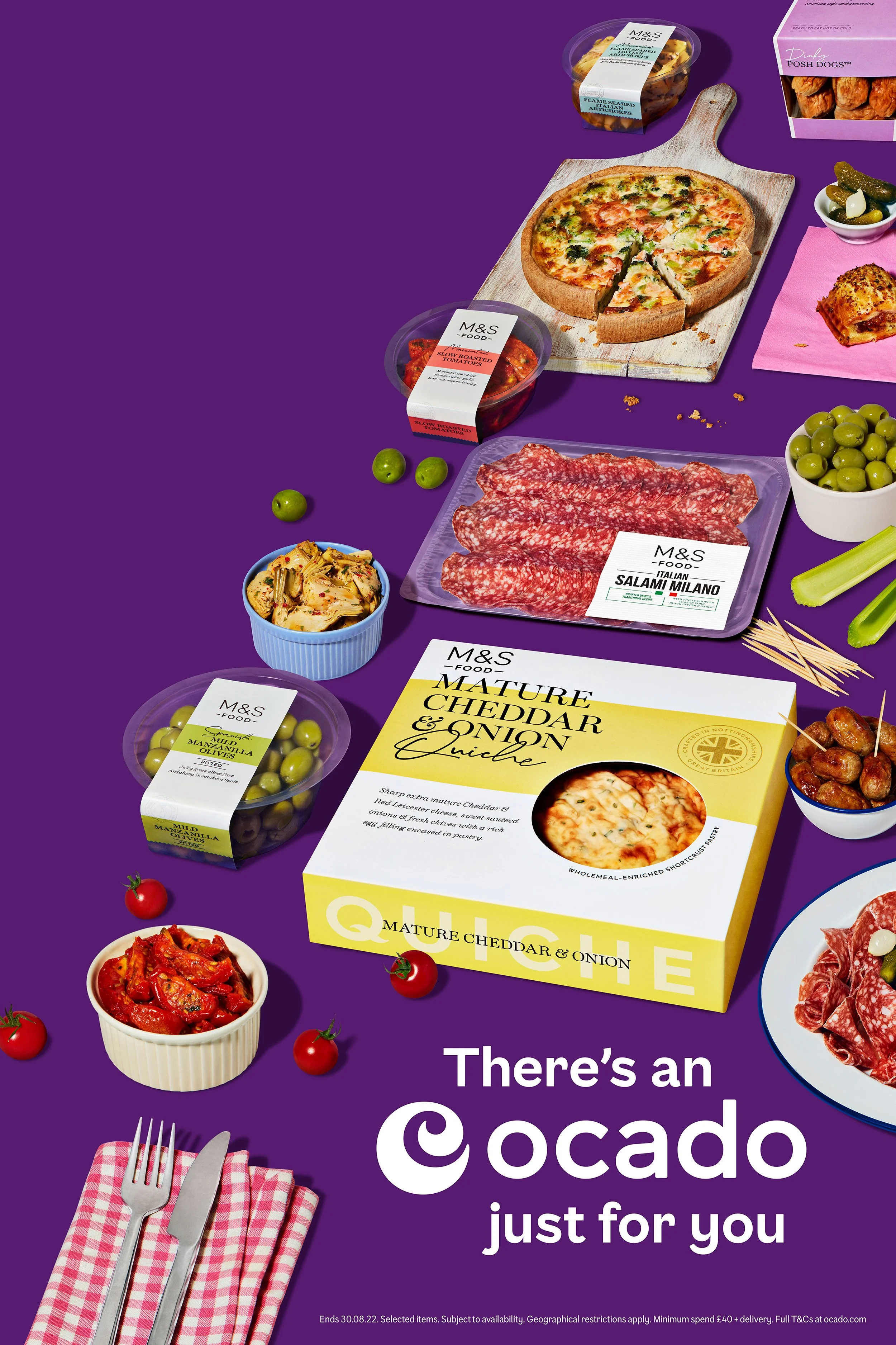 Ocado food advertisement featuring a quiche, Italian salami, olives, artichokes, tomatoes, sausages, and other party foods on a purple background.