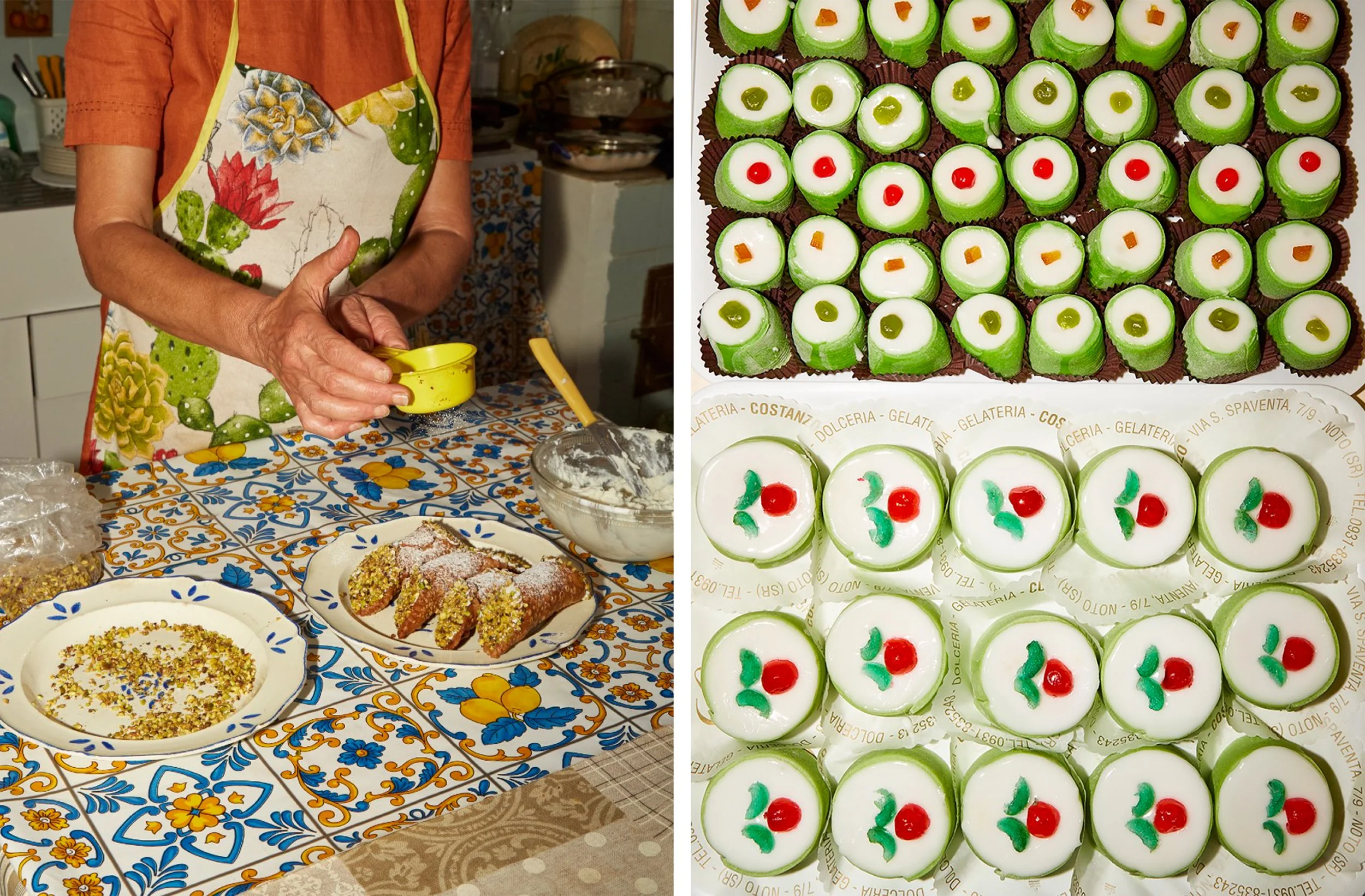 Person preparing Sicilian cannoli in a kitchen beside trays of green pistachio cannoli decorated with white icing and colorful candied fruit.