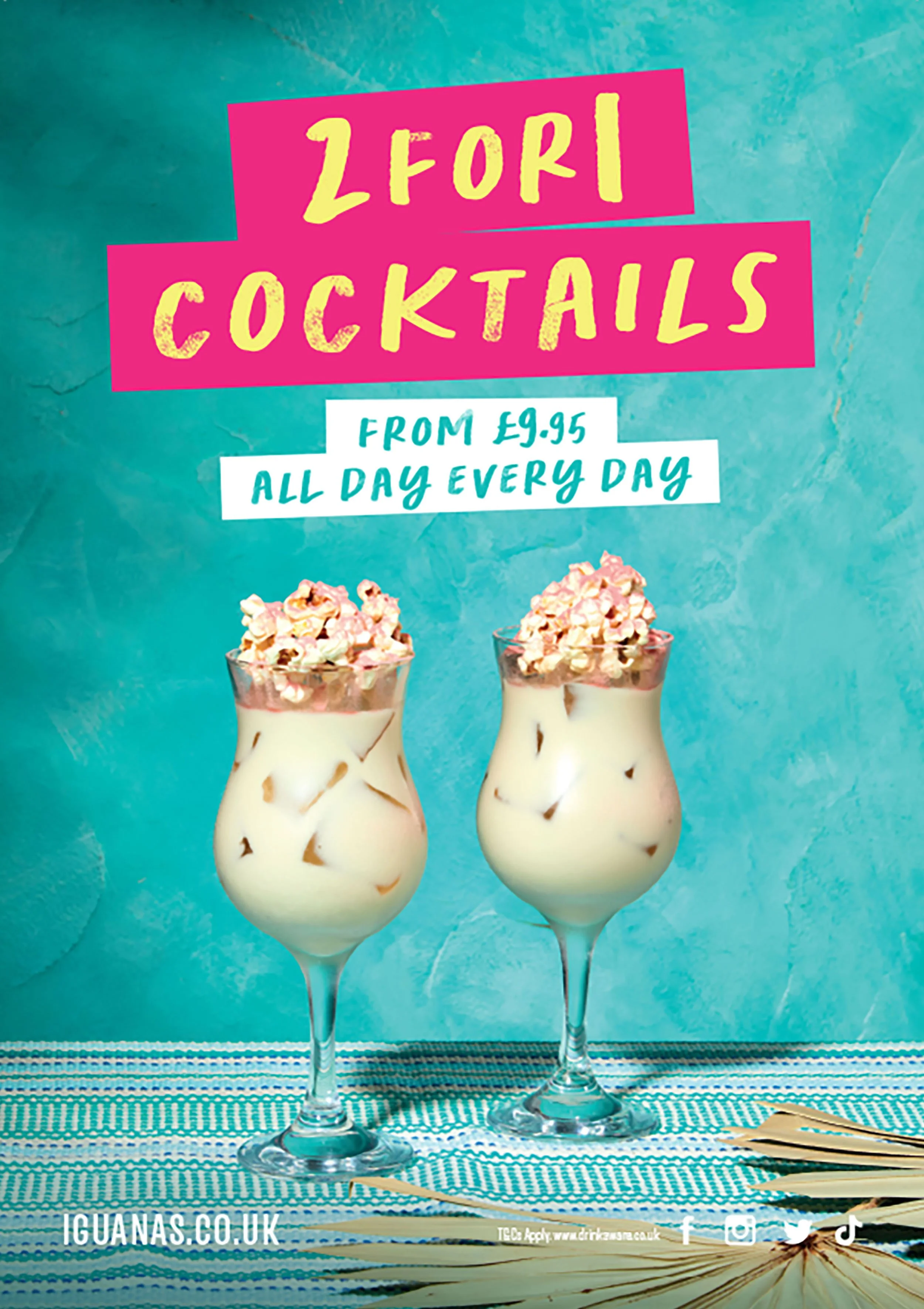 Two glasses of popcorn cocktails with caramel drizzle and popcorn topping, advertised as cocktails from £9.95 all day every day.