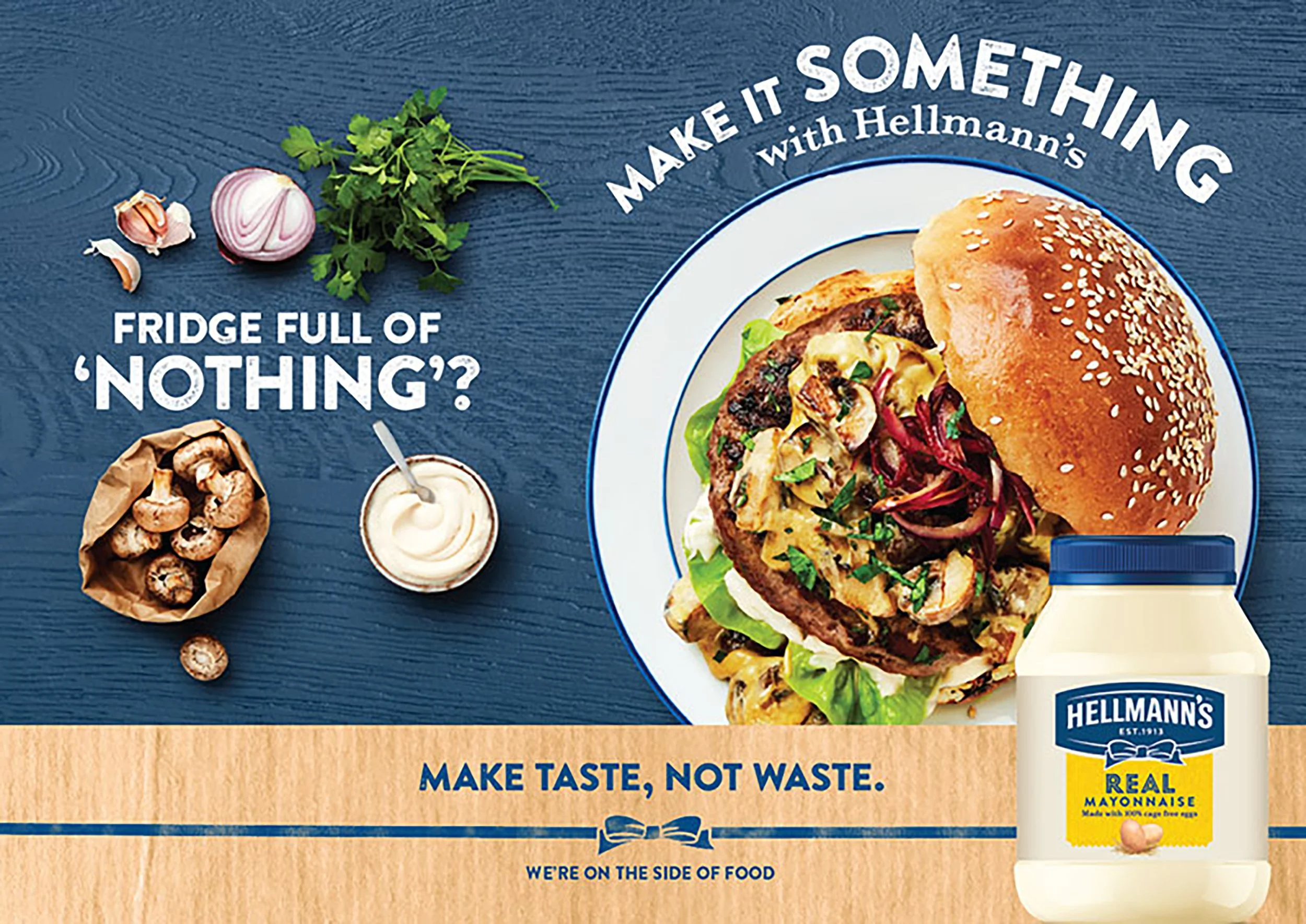 Hellmann’s mayonnaise advertisement featuring a loaded sesame-seed burger, fresh ingredients, and the slogan “Make taste, not waste.”