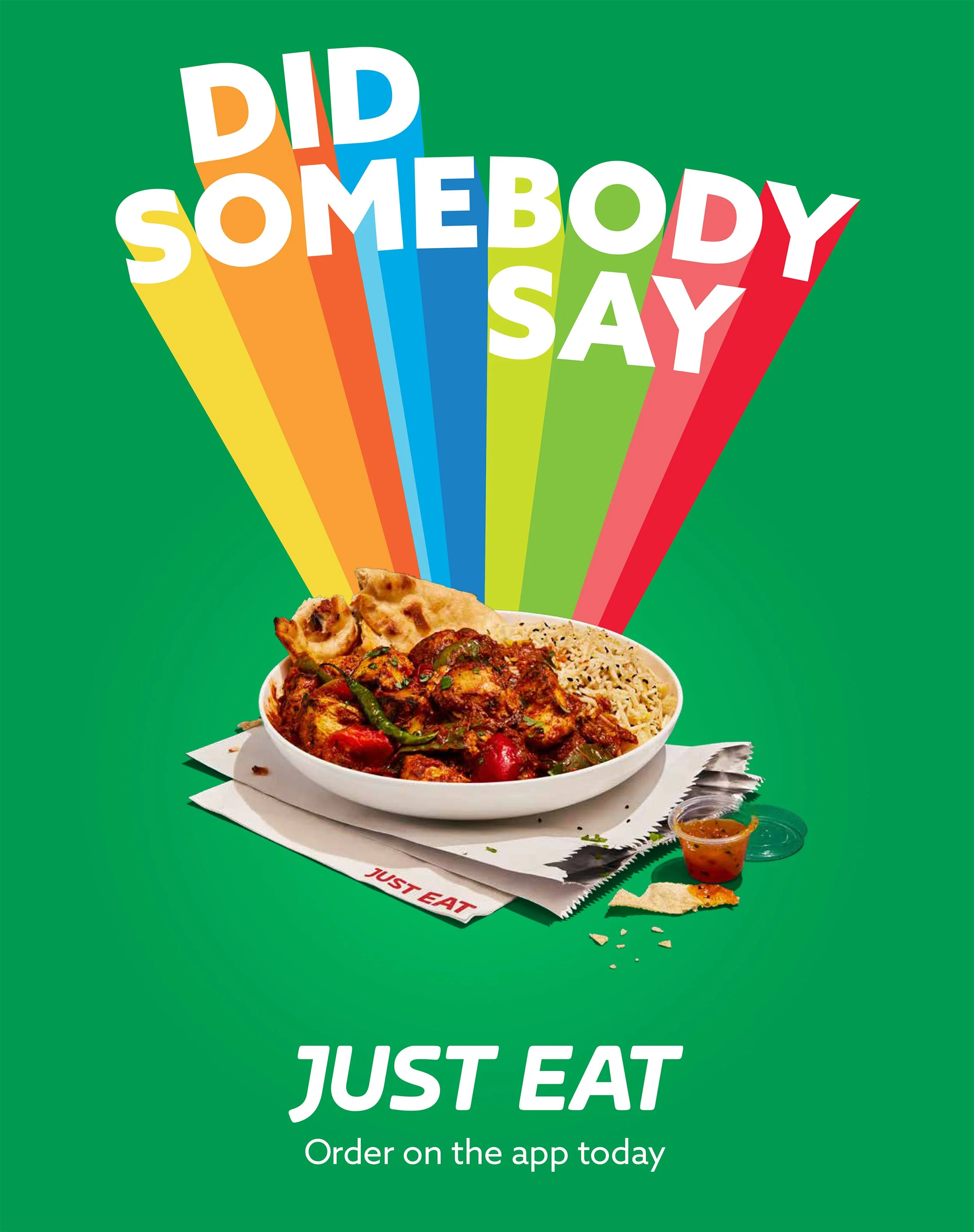 Colorful “Uber Eats” advertisement featuring a bowl of Indian food, naan, dipping sauce, and the text “Just Eat—Order on the app today.”