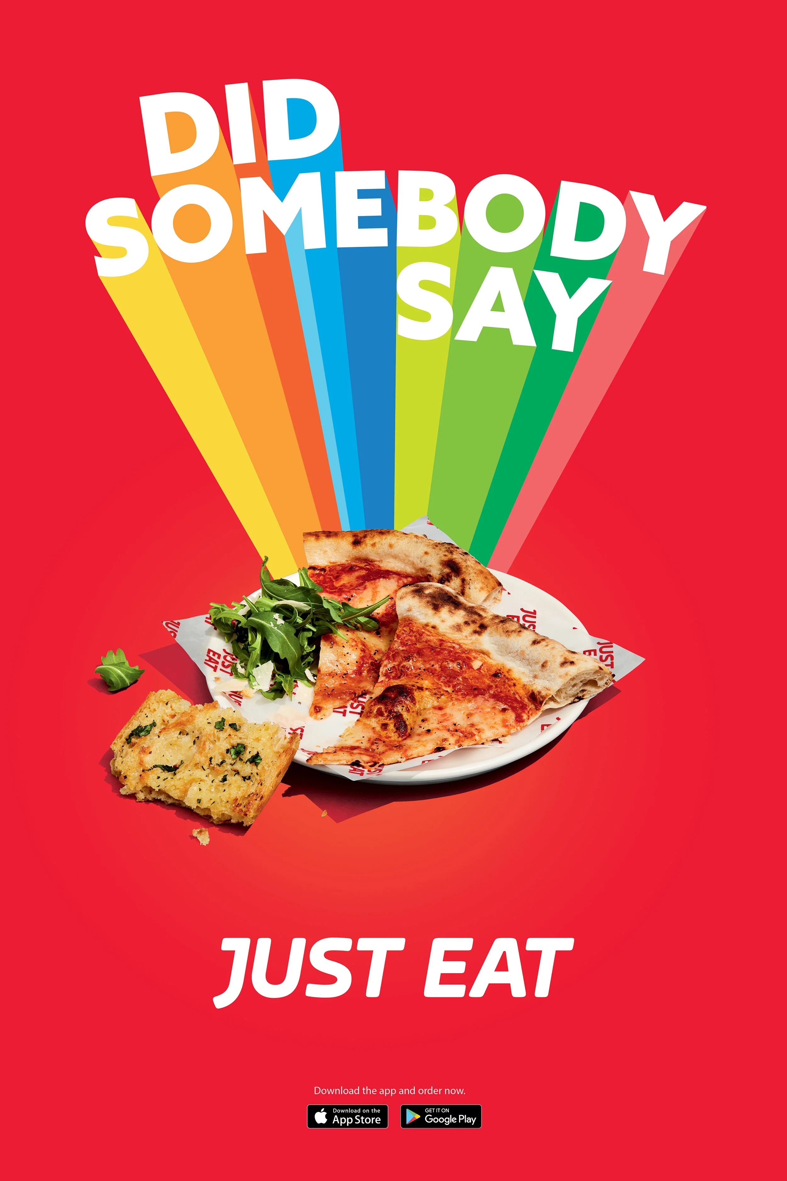Just Eat pizza advertisement featuring colorful rays, sliced pizza, garlic bread, arugula, and app download badges on a red background