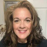 Debi Wilson, creator of CaregiverHQ and author of God in the Hallway