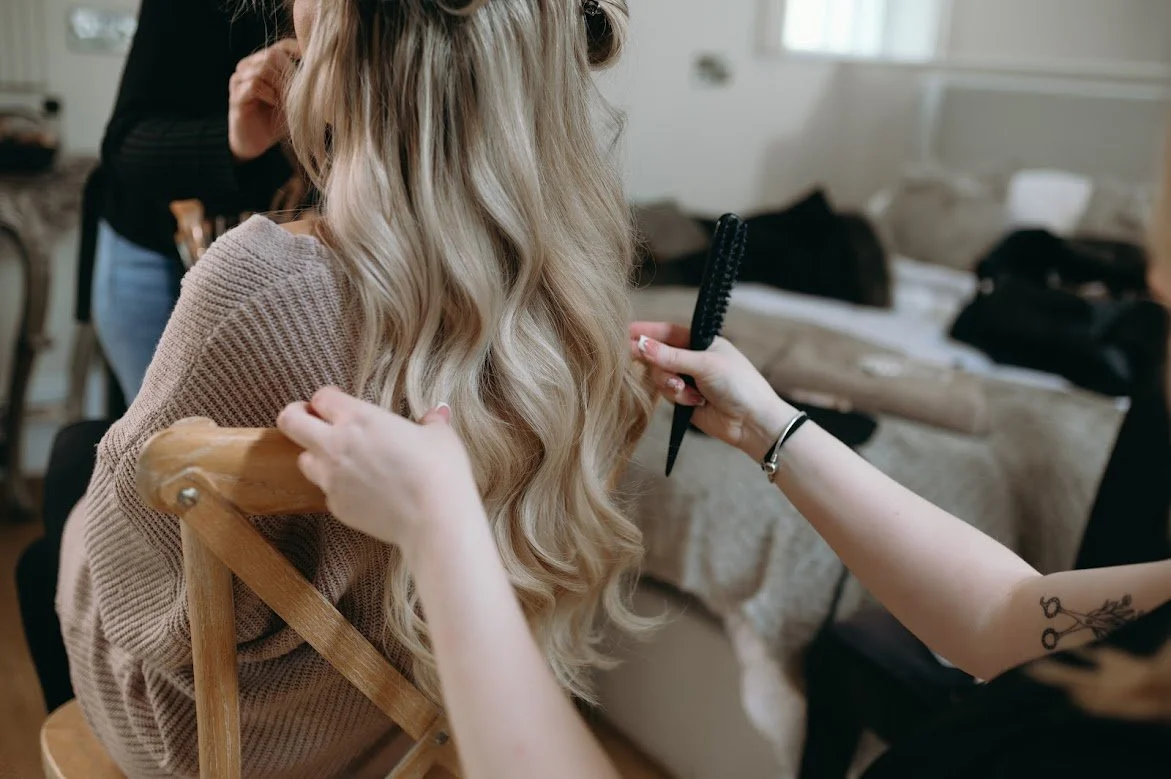 A Bride Having her hair styled for her wedding by Hairbymolly