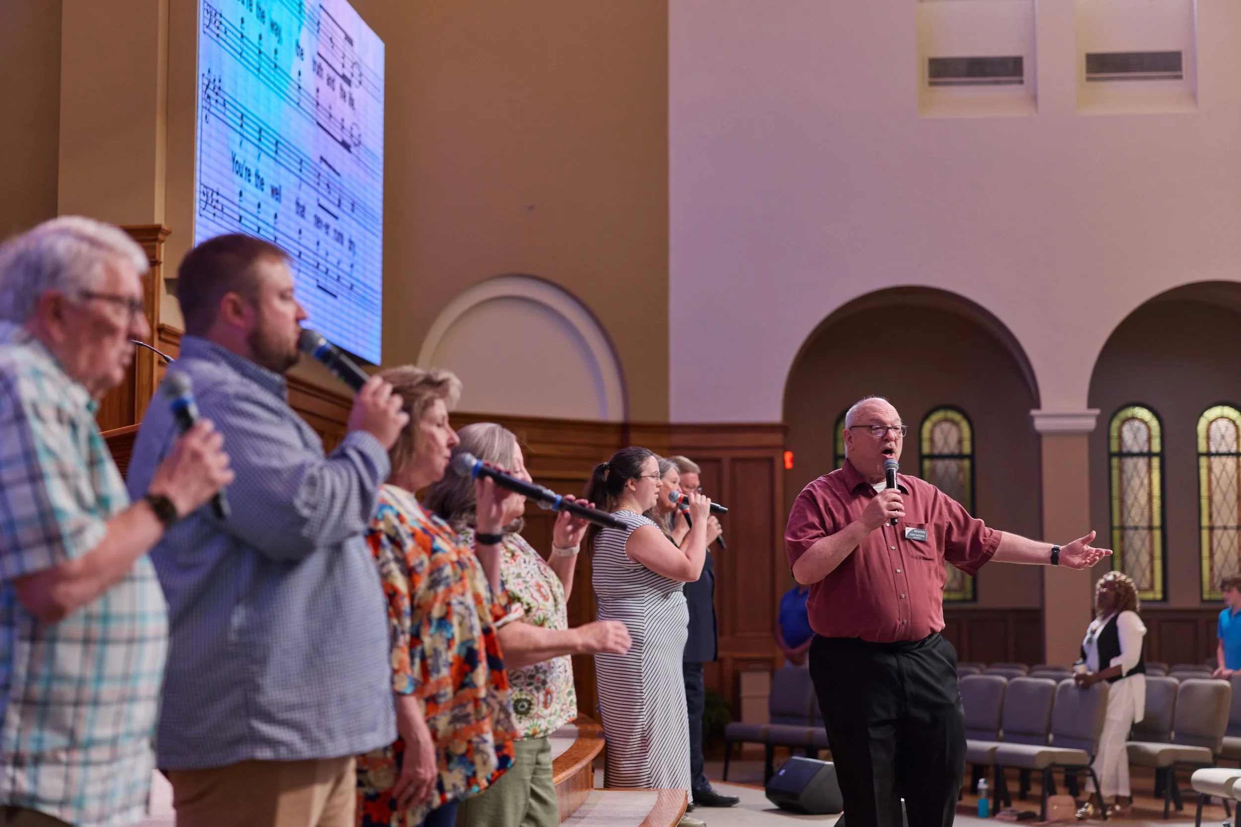 Gary Moyers leading a cappella worship with the vocal team at Broadway