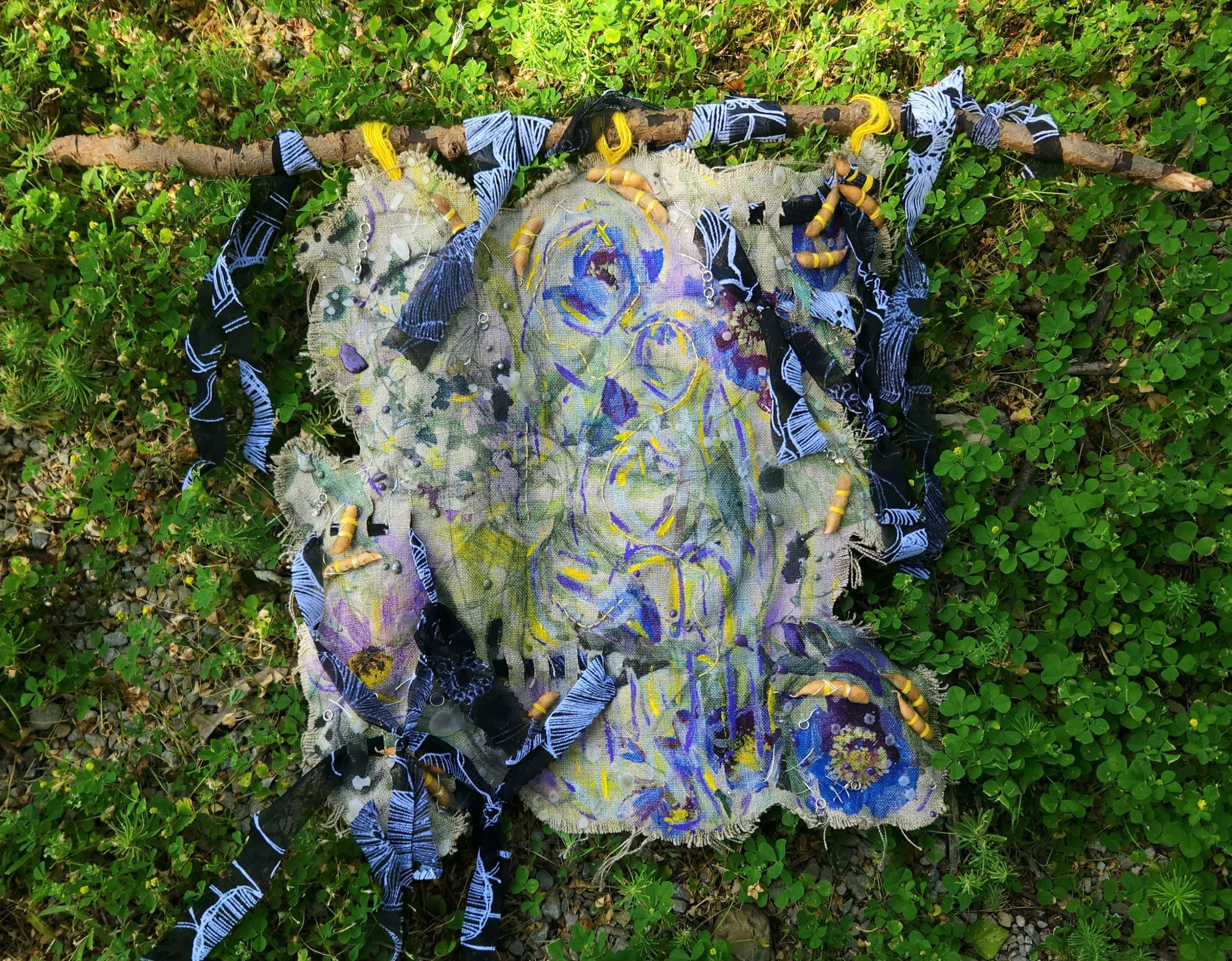 “First Day of School”
June 2026
Fabric, Embroidery Thread, Soy Beans, Silver Wire, Jump Rings, Gems, and Branch
18” x 14”