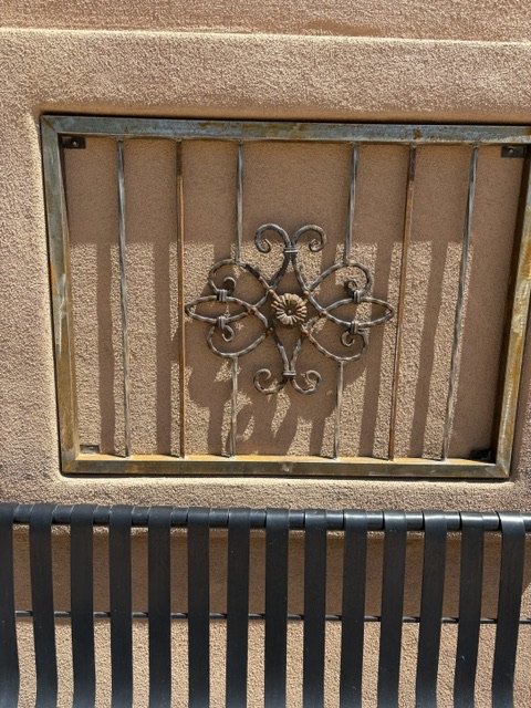 Wrought iron twists with center piece 2.jpeg