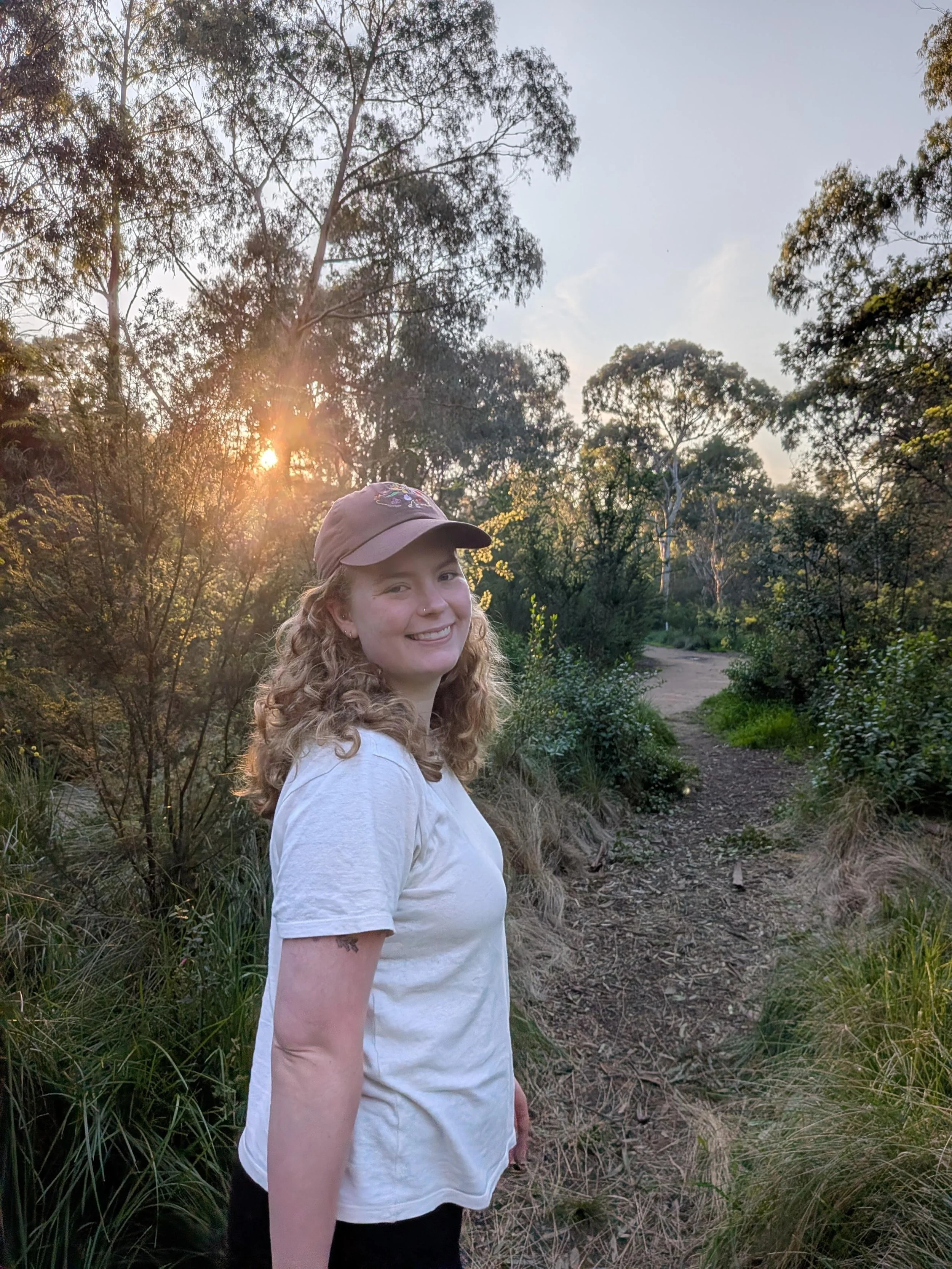 The maker, smiling, in the sunshine.