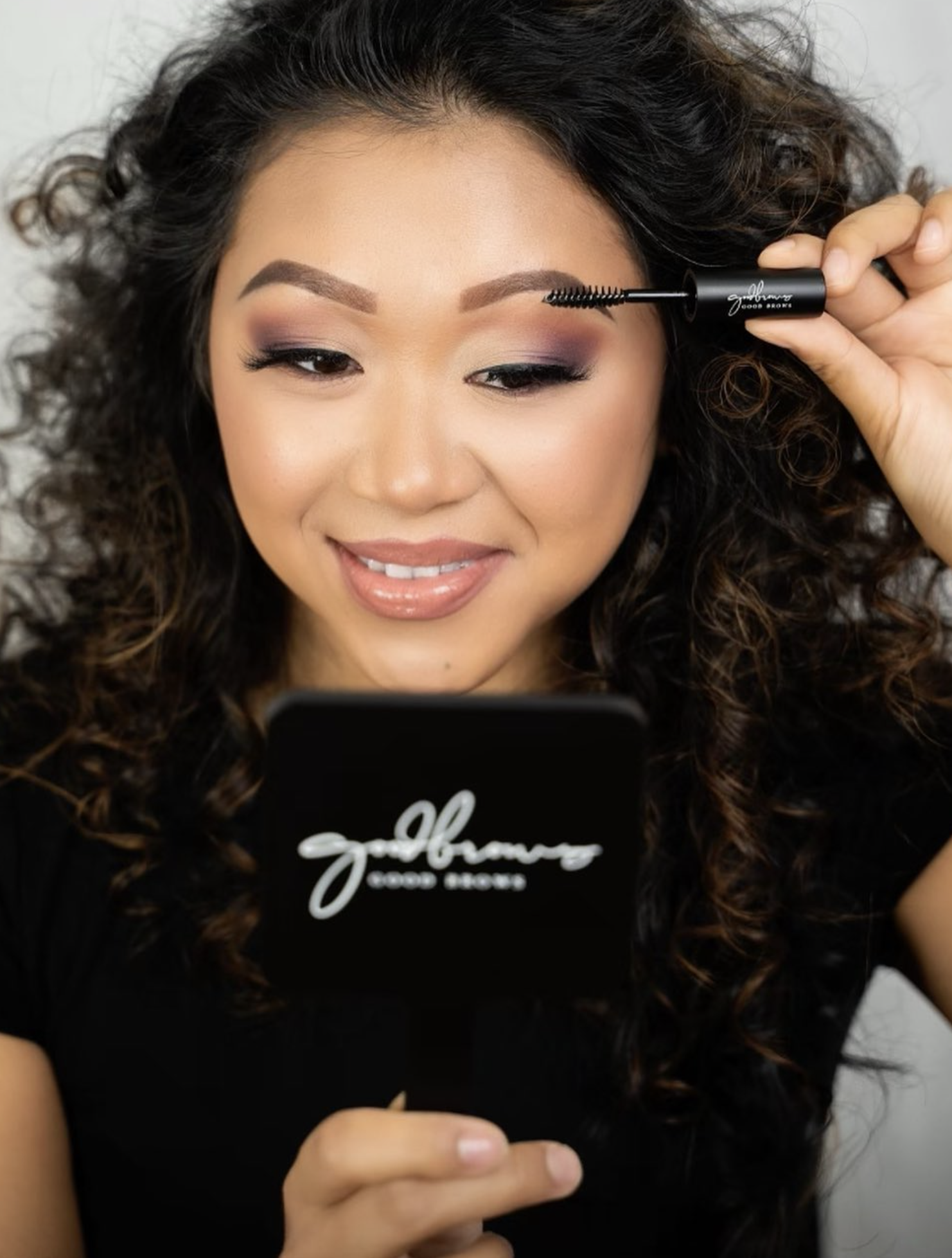 Model is using our Clear Brow Gel