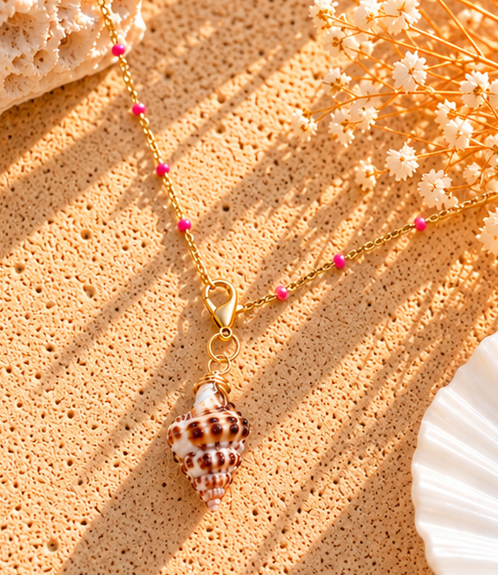 elua conch shell charm on necklace.png