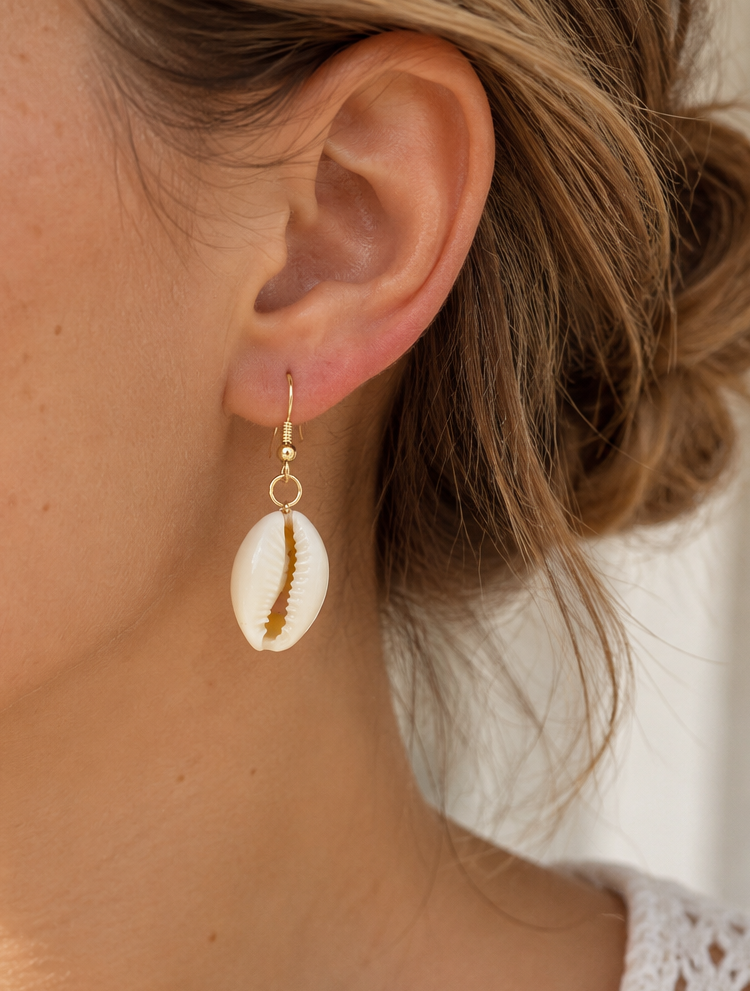 Haumea cowrie shell earrings 3.png