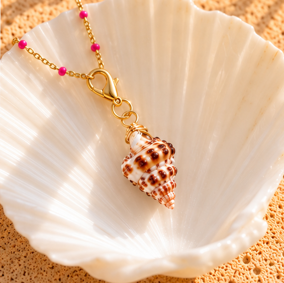 elua conch shell charm on necklace 2.png