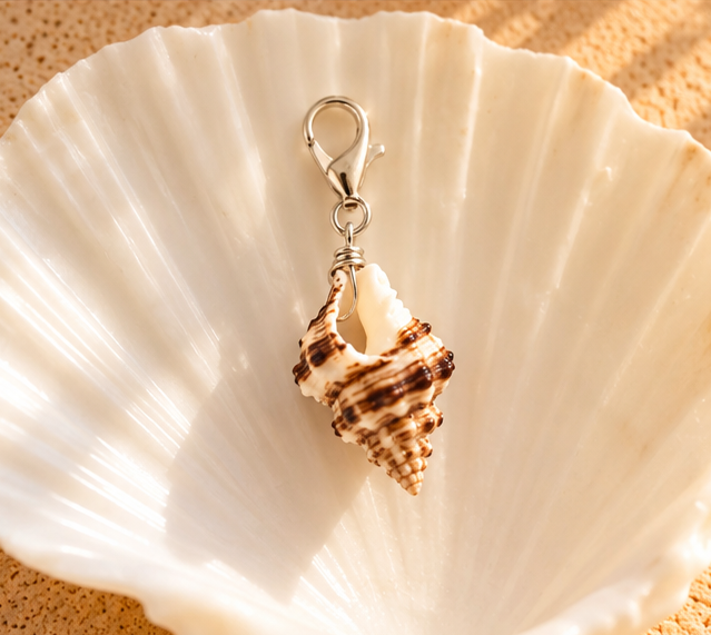 nalu conch shell charm - silver.png