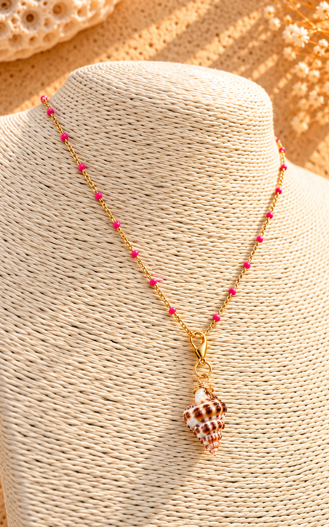 elua conch shell charm on necklace 3.png