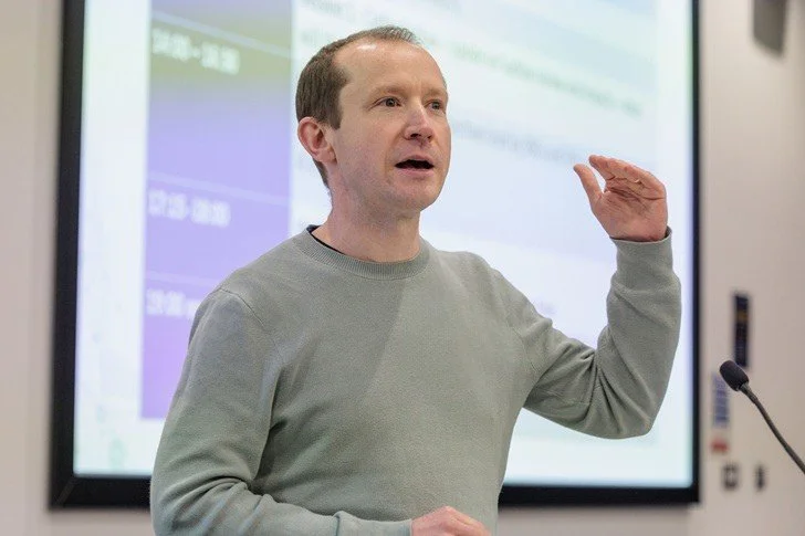 Photo of Jonathan Wood speaking at an event