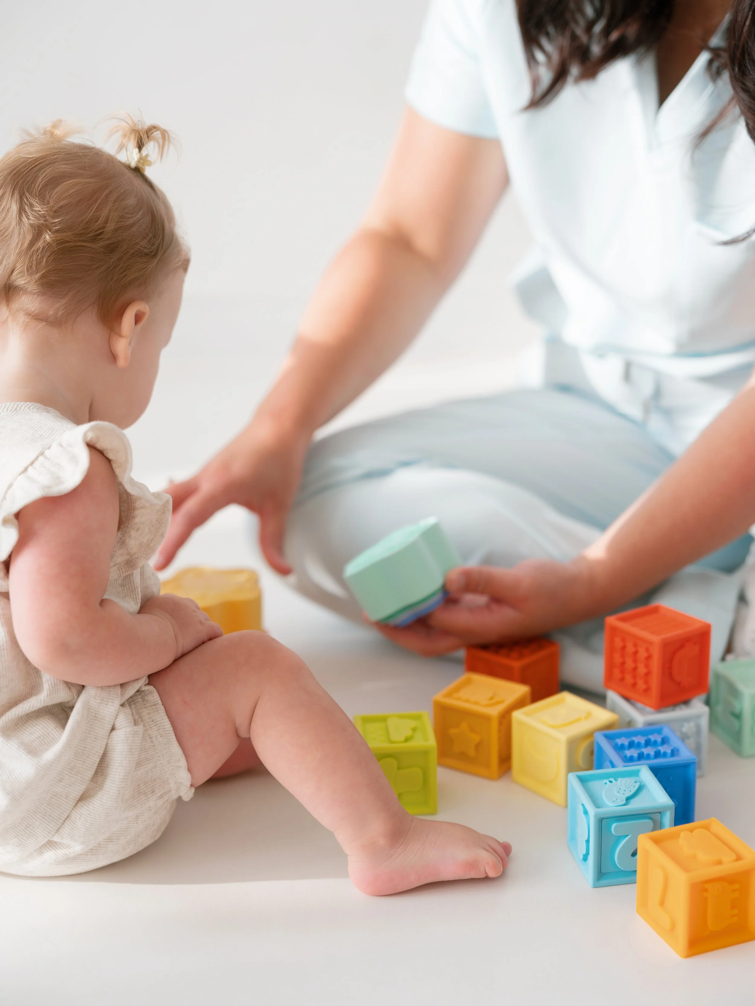Baby playing with blocks