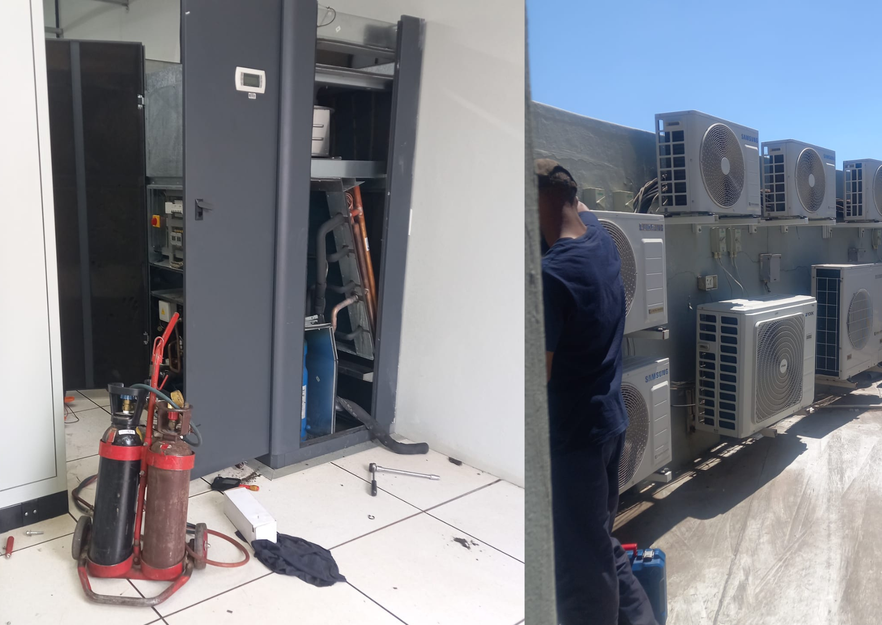 HVAC technician servicing an open commercial air-conditioning unit beside multiple outdoor condenser units.