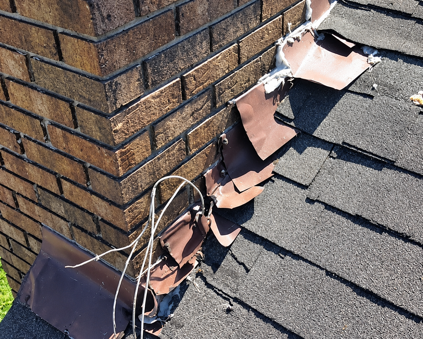 Damaged chimney flashing and shingle details
