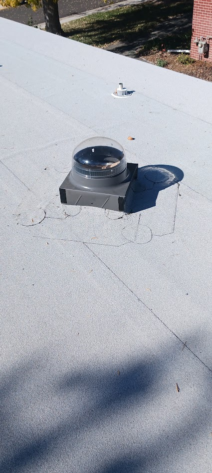 Low-slope roof and vent flashing condition assessment