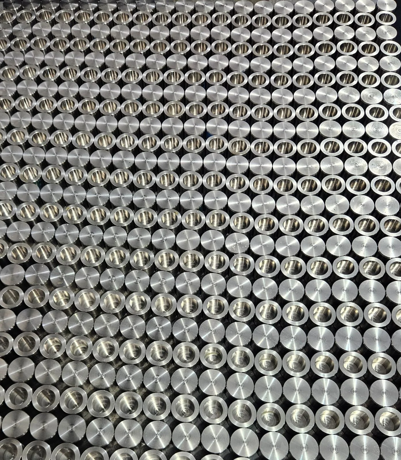 Precision-machined caps for polycrystalline diamond (PCD) dies used in wire drawing operations, designed to securely hold and support the dies during the drawing process.