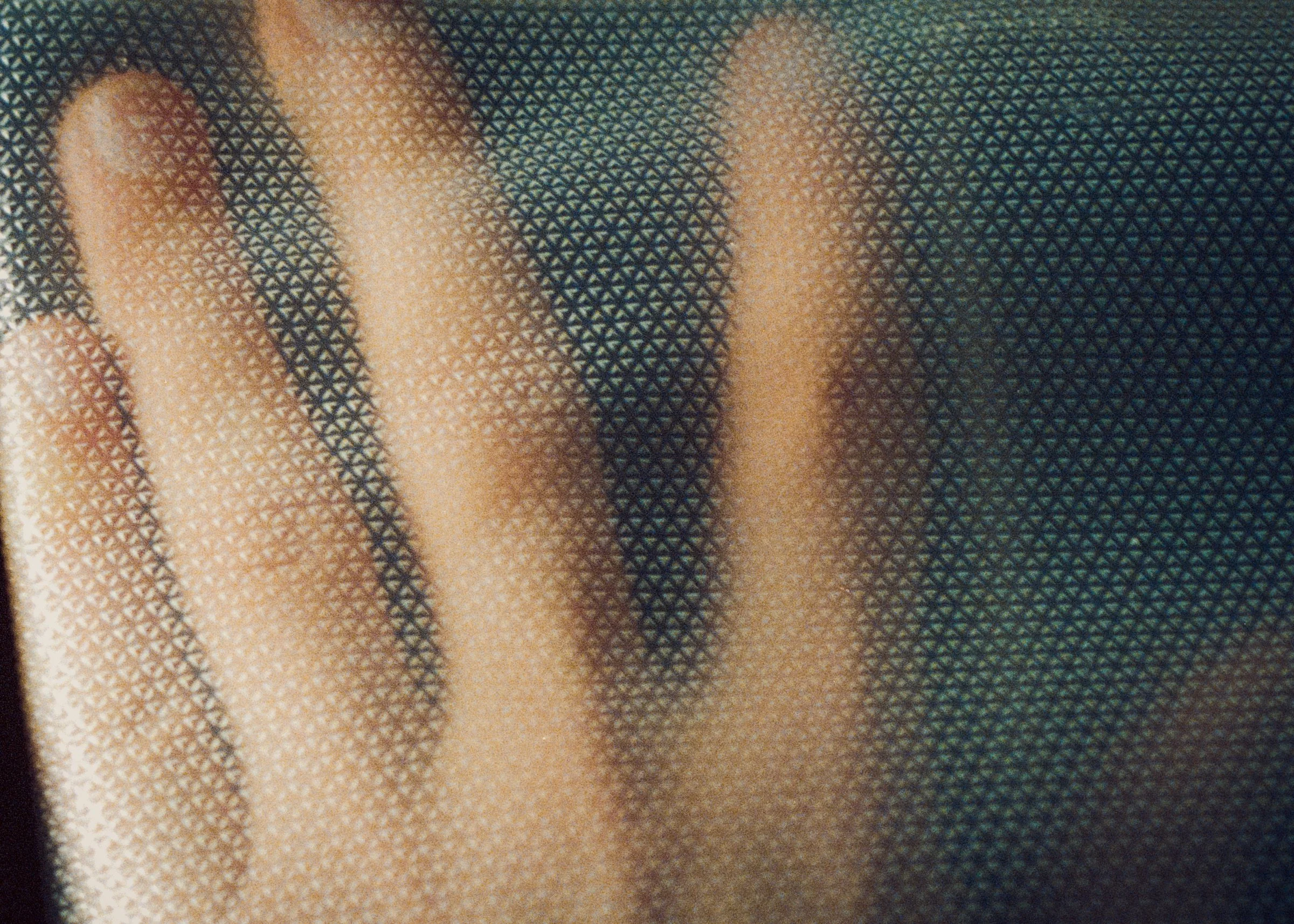 35mm Film photo of hand close up with texture of Backcountry Skin texture