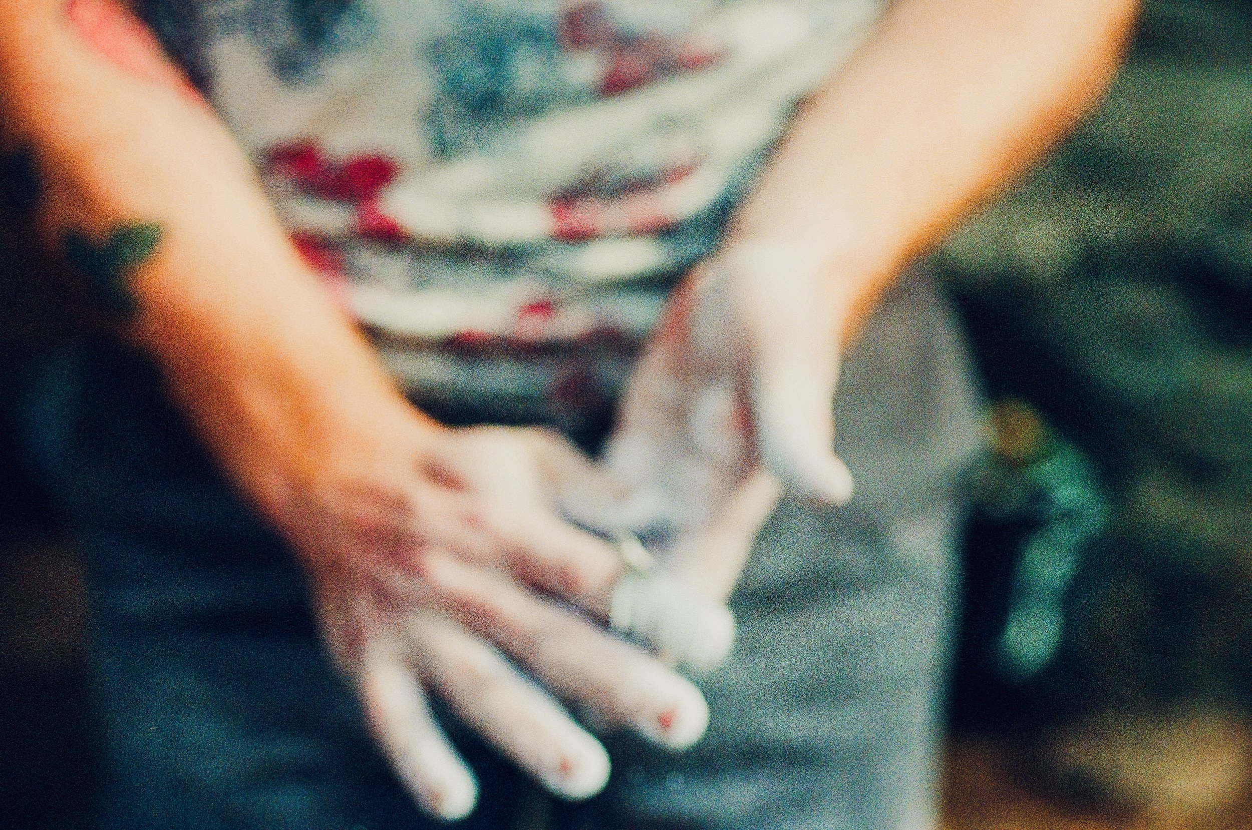 35mm Film Photo of out of focus hands dusting off Chalk