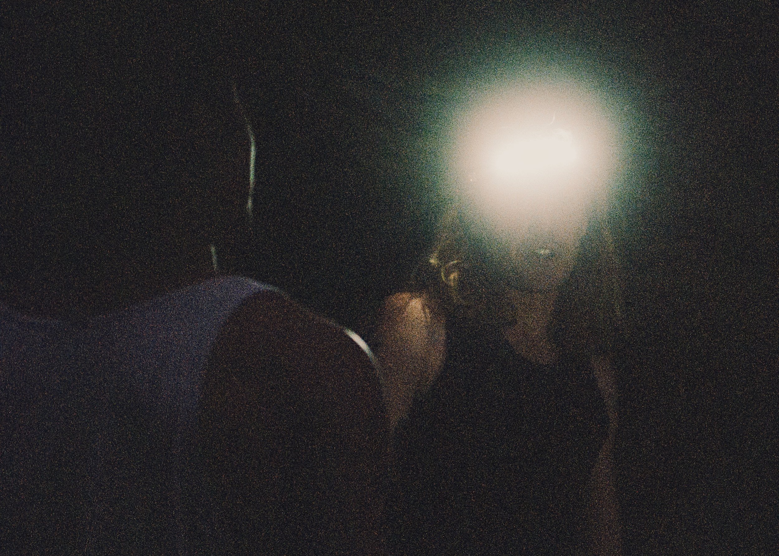 35mm Film Photo of Rock Climbers with Headlamp