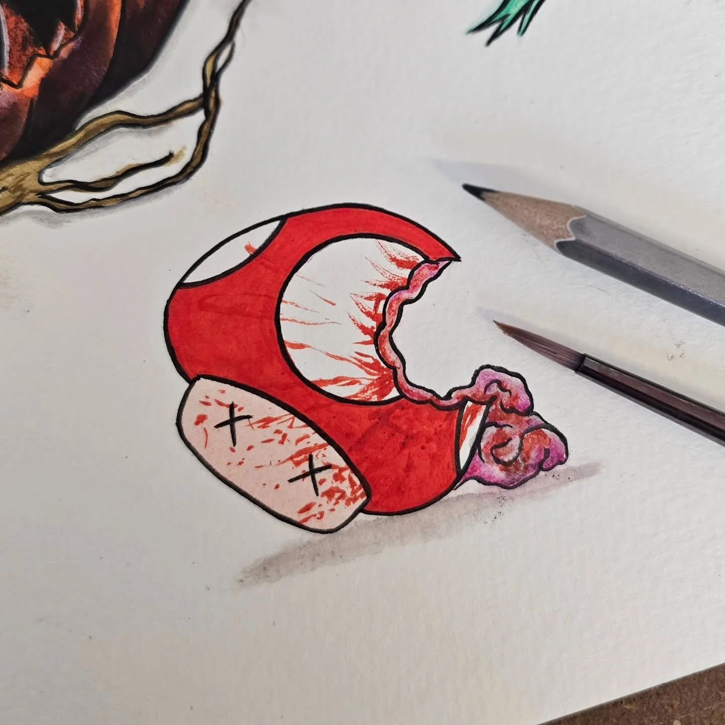 Hand-drawn cartoon of a broken red apple with exposed flesh and crossed-out eyes, surrounded by art tools such as pencils and brushes.