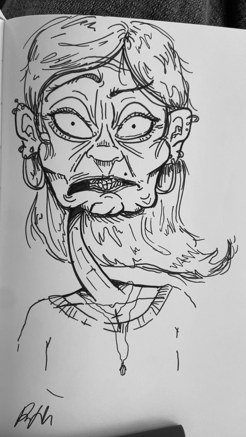 Black and white sketch of a woman with exaggerated facial features, large eyes, and multiple earrings, wearing a zip-up shirt.