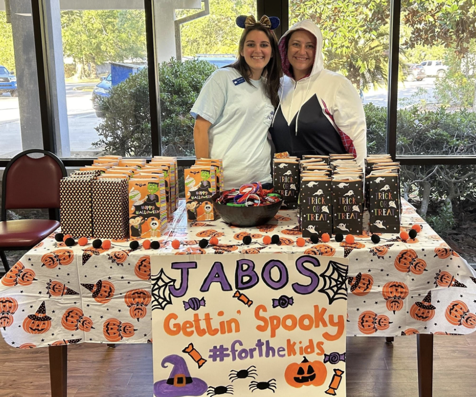 Junior Auxiliary members at a Halloween booth