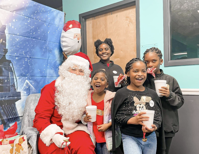 Kids visiting Santa at a Junior Auxiliary holiday event