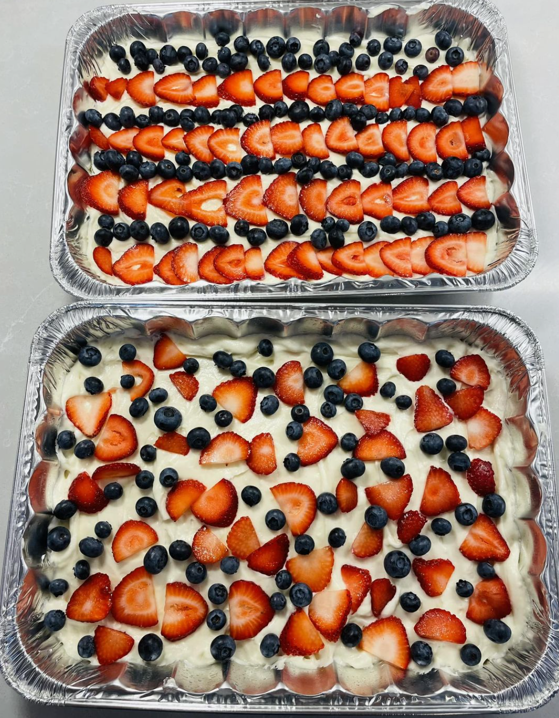 4th of July sugar cookie cake topped with strawberries and blueberries