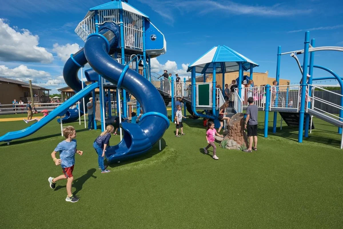 Kids running to the playground at the Ark Encounter