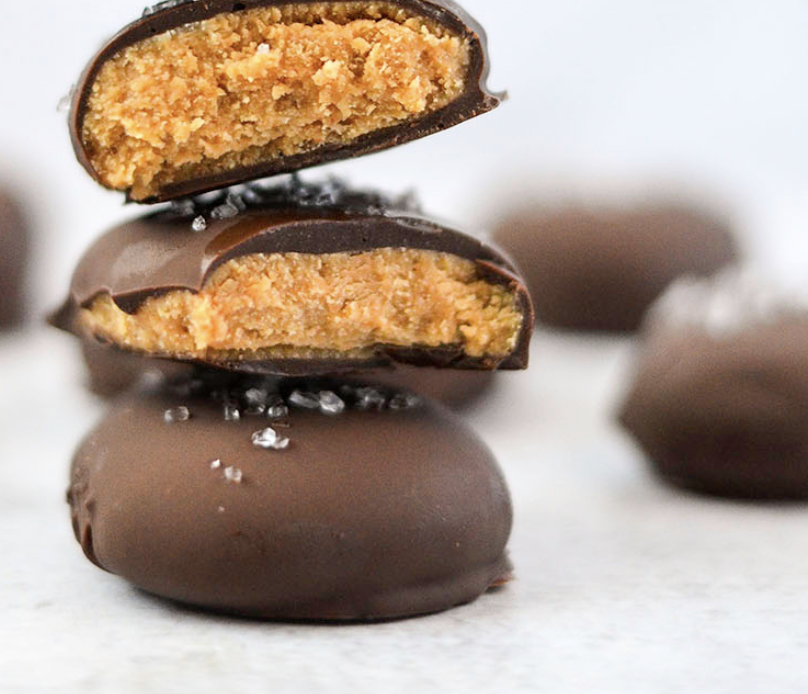 Homemade chocolate peanut butter eggs cut in half